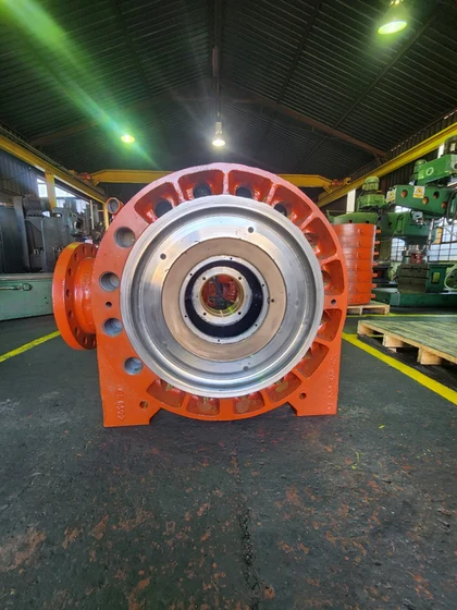 Refurbished orange industrial pump in the Fedpump workshop
